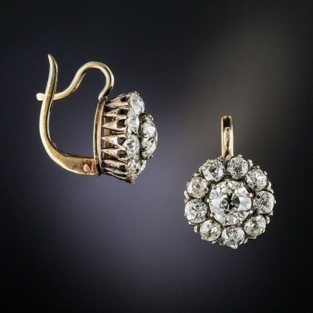 Elegant gold earrings with gemstone inlay